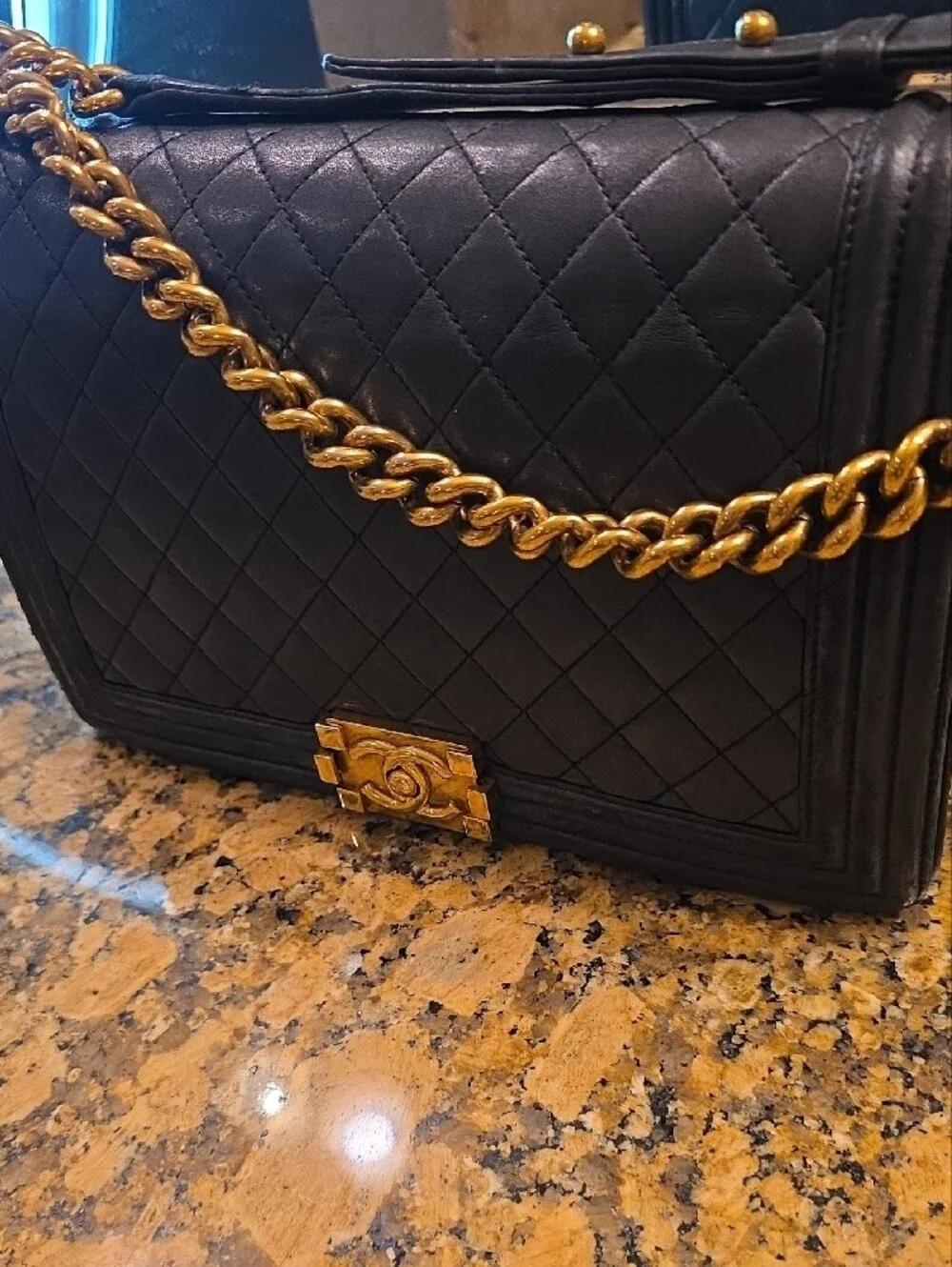 CHANEL Medium Boy Bag Quilted Lambskin Crossbody with Gold Hardware.